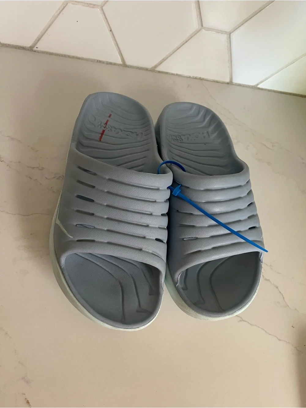 Hoka One One Slide Sandals in Light Gray with White Sole